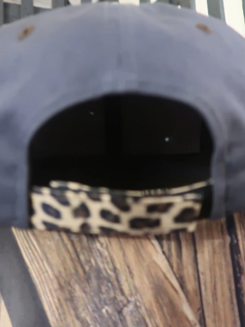 One Size Black Snapback Cap with Leopard Brim